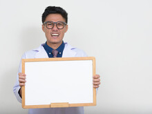 Portrait Of Happy Handsome Asian Man Doctor Smiling