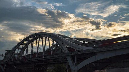 Wall Mural - Sun glare on a modern train , moving on the steel overpass