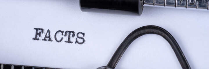 Fototapete - The word Facts written on an old typewriter	. Panoramic image