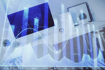 Double exposure of financial graph drawing and office interior background. Concept of stock market.