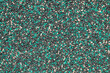 © nskyr2 - Texture of the street pavement of tracks made of rubber granular crumb. Close-up.
