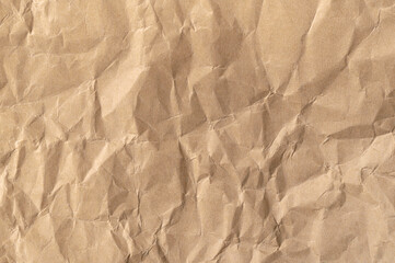 Wall Mural - Crumpled brown paper background.