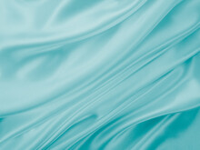 Beautiful Elegant Wavy Turquoise Silk Or Satin Luxury Cloth Fabric Texture, Abstract Background Design.