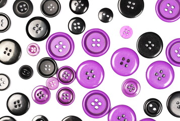 Black and purple sewing buttons isolated on white background