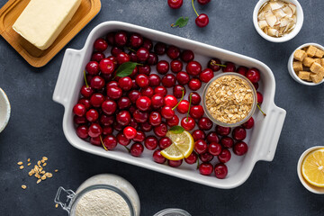 Poster - Baking dish with ingredients for cooking cherry pie on top view