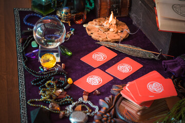  Tarot cards, Concept of fortune telling and predictions, magical rituals and wicca elements on a table