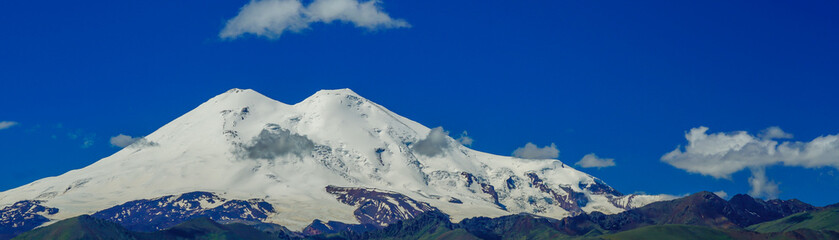 Wall Mural - Panorama from Elbrus with blue Sky, North Caucasus, Russia