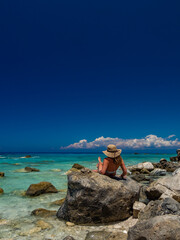 Wall Mural - Woman at the beach in Greece