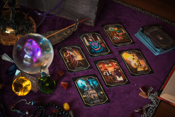 Tarot cards, Concept of fortune telling and predictions, magical rituals and wicca elements on a table