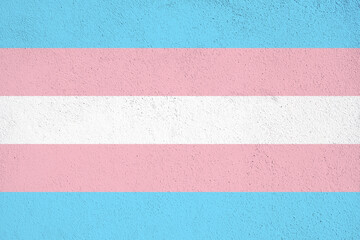 Transgender flag painted on Concrete wall on outdoor. Transgender grunge background