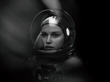 Woman Astronaut With Glass Helmet And Dramatic Lighting - 3d Rendering