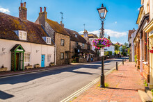 A View Up The Traditional High Street In The Town Of Rottingdean, Sussex, UK In Summer