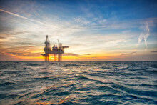 Offshore Oil Rig At Sunset