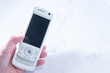 © patchii - 2000年代のスライド型携帯電話。日本のガラケー。