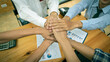 © ArLawKa - Success and win-win - happy business teams celebrate victory by working together.