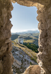 Wall Mural - Santo Stefano di Sessanio (Italy) - The ruins of Rocca Calascio, old medieval village with castle and church, 1400 meters above sea level on Apennine mountains, heart of Abruzzo region