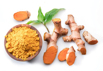 Wall Mural - Fresh turmeric rhizome and turmeric powder isolated on white background.