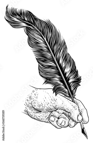 A hand holding writing with...