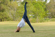 © Ranta Images - Young beautiful woman exercising at the park outdoors