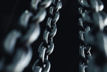 Strong Brazed Industrial Chains On A Black Background.