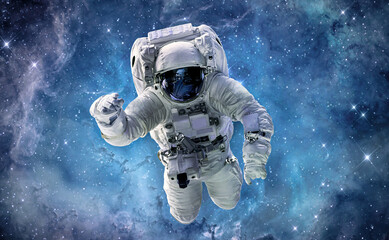Aufkleber - Astronaut in bright galaxy. Universe and spaceman. Outer space. Elements of this image furnished by NASA