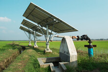 Solar Panels Produce Electric Which Can Run Submerge Water Pump For Irrigation Of Water In Agricultural Field