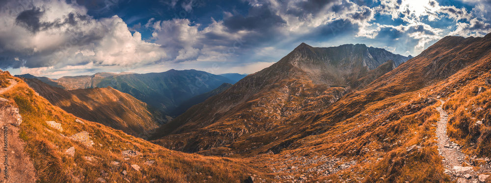 Mountain landscape. Hiking fagaras mountains in Romania. Carpathians, Transilvania, Romania, Europe. Transfagarasan road. Panorama - obrazy, fototapety, plakaty 