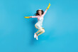 © deagreez - Full length body size view of her she nice attractive pretty glad funky cheerful cheery maid jumping running having fun isolated on bright vivid shine vibrant blue color background