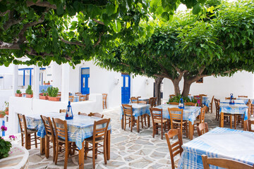 Wall Mural - Traditional greek street with cafes in Paros island, Cyclades, Greece