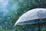 Fototapeta  - Transparent umbrella under rain against water drops splash background. Rainy weather concept.