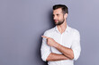© deagreez - Portrait of positive confident lawyer economist point index finger copyspace indicate ads promotion recommend suggest select wear white shirt isolated over gray color background