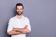 © deagreez - Portrait of his he nice attractive content cheerful cheery man employer director corporate expert folded arms isolated over grey violet purple pastel color background
