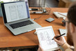 © pressmaster - Over shoulder view of man using digital tablet and stylus and drawing scheme for ui design
