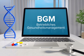 Wall Mural - BGM (Betriebliches Gesundheitsmanagement). Laptop mit Begriff/Text auf Monitor. Computer von Arzt im Büro. DNA und Stethoskop. Medizin, Gesundheitswesen