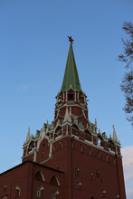 Troitskaya Tower Of Moscow Kremlin At Red Square In Moscow City, Russia. Red Star On Tower Shines On Background Of Sunset Blue Sky. Architecture Monument, Architectural Landmark, Sight