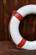 Closeup Of Lifebuoy On Wooden Fence