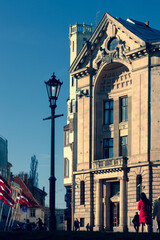 Wall Mural - Ancient building on Riga square with flags