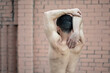 © Vladimir - Man does a warm-up before training on the street. Workout, training, lifestyle