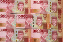 Indonesian Rupiah For Background. Indonesian Rupiah Banknotes Series With The Value Of One Hundred Thousand Rupiah IDR 100.000.