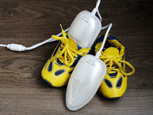 Electric Ultraviolet Shoe Dryer And Yellow Sneakers