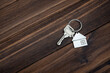 house key on wood background
