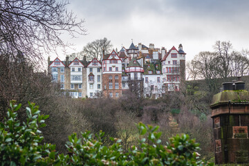 Wall Mural - Residential buildings in the Old Town of Edinburgh city, Scotland, UK, view from Princes Street Gardens