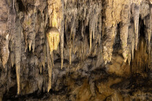 Stalactite Decorations In The Dark Cave