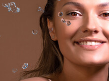 Refresh Your Face, Wash With Clean Water, Concept. A Splash Of Water And A Portrait Of A Young Beautiful Woman,