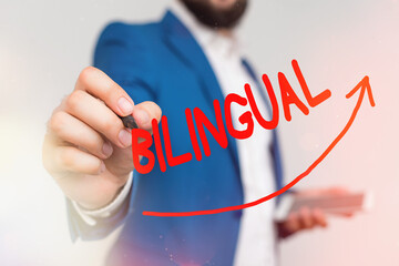 Writing note showing Bilingual. Business concept for using or able to use two languages especially with equal fluency Digital arrowhead curve denoting growth development concept