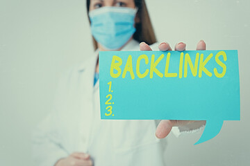 Wall Mural - Conceptual hand writing showing Backlinks. Concept meaning links from one website to a page on another website or page Laboratory technician featuring paper accessories smartphone