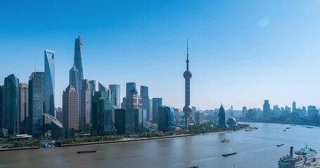 Fototapete - time lapse of the shanghai cityscape in afternoon, pudong skyline and busy huangpu river scene , China.