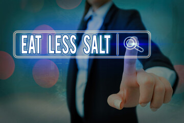 Wall Mural - Conceptual hand writing showing Eat Less Salt. Concept meaning reducing the sodium intake on the food and beverages Web search digital futuristic technology network connection