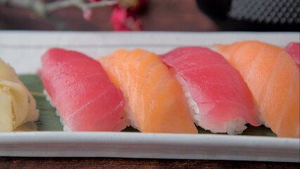 Poster - japanese nigiri sushi with plum blossom 