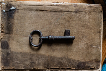 old key on old wooden background